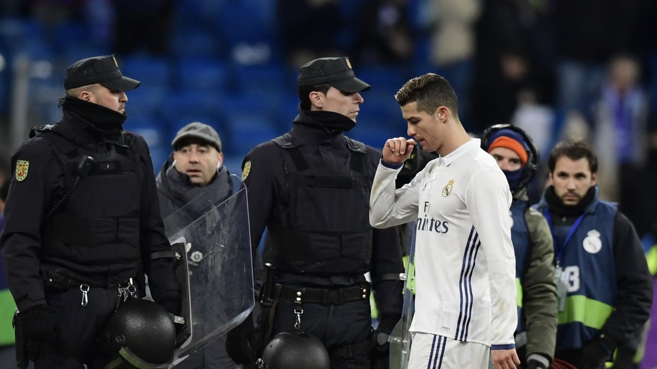 Real Madrid's Portuguese forward Cristiano Ronaldo leaves the pitch at the end of the Spanish Copa del Rey (King's Cup) quarter-final first leg football match Real Madrid CF vs RC Celta de Vigo at the Santiago Bernabeu stadium in Madrid on January 18, 201