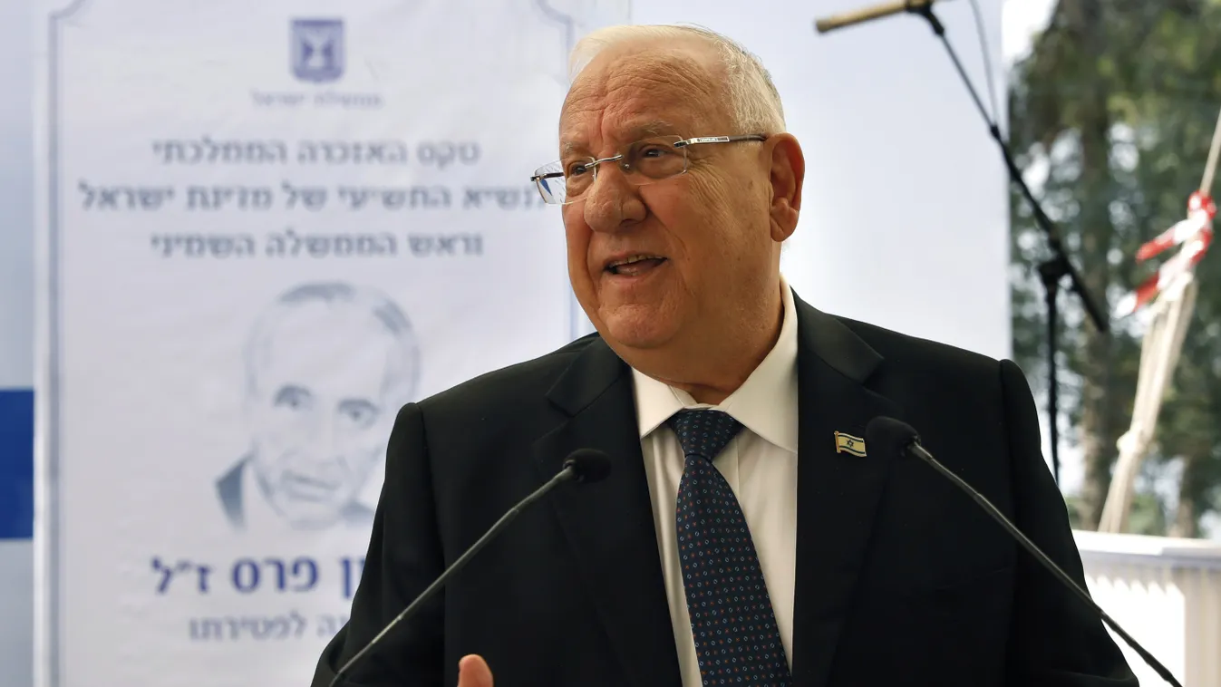 politics Horizontal Israeli President Reuven Rivlin delivers a speech during a ceremony marking one year since the death of the late Israeli President Shimon Peres on September 14, 2017 at the Mt. Herzel cemetery in Jerusalem.
Israel begins marking one ye