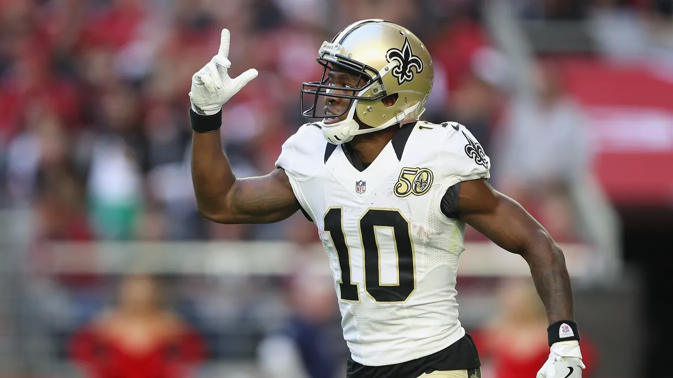 GLENDALE, AZ - DECEMBER 18: Wide receiver Brandin Cooks #10 of the New Orleans Saints reacts after scoring a 65 yard touchdown reception in the second quarter against the Arizona Cardinals during the NFL game at the University of Phoenix Stadium on Decemb