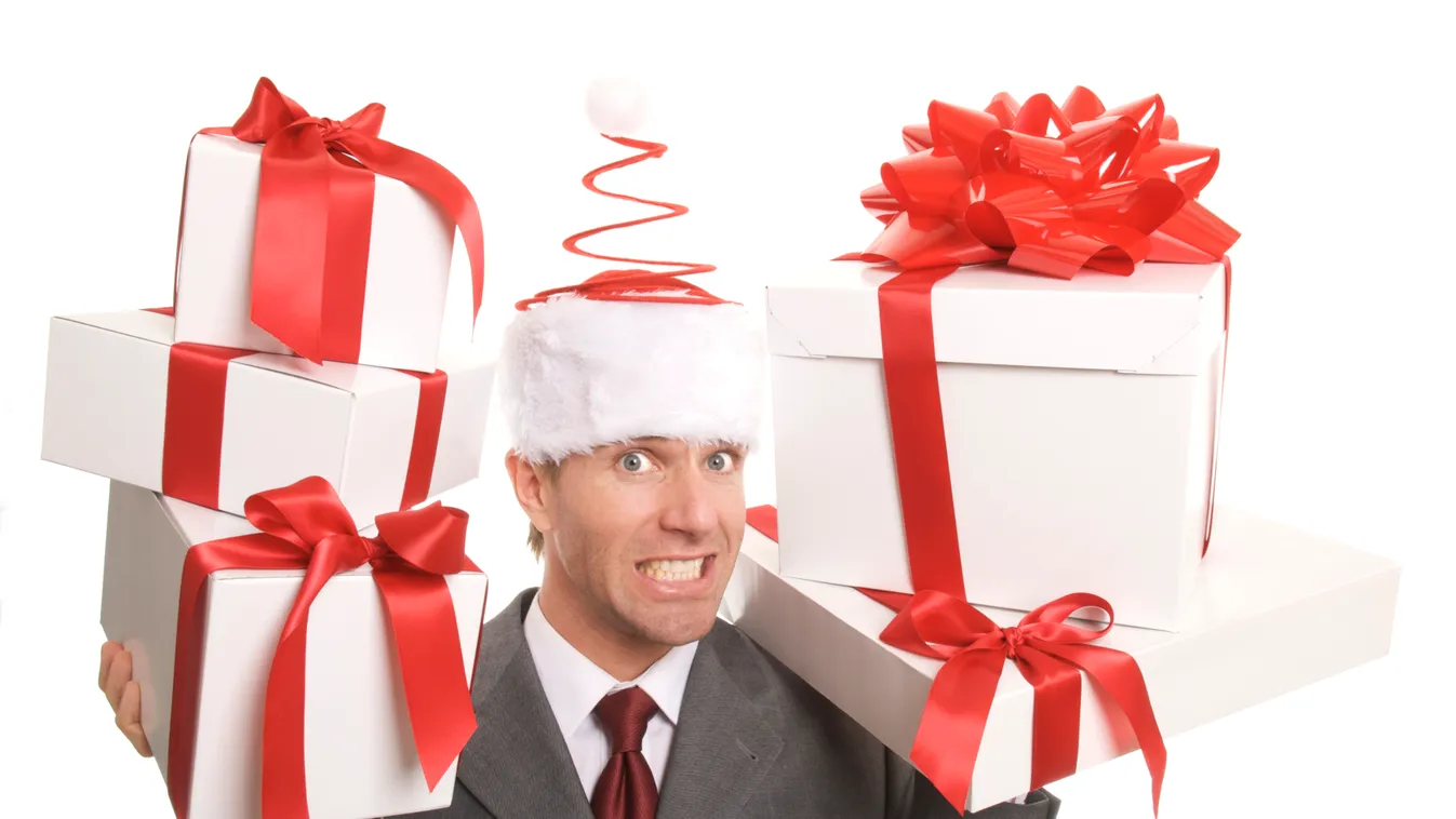 Smiling Man Carries Presents in Gift Delivery White Background "White Background Brightly Lit Vibrant Color Businessman Holiday Men Small Group of Objects Copy Space Celebration Christmas Present Smiling Shopping Holding Giving Excess Caucasian One Person
