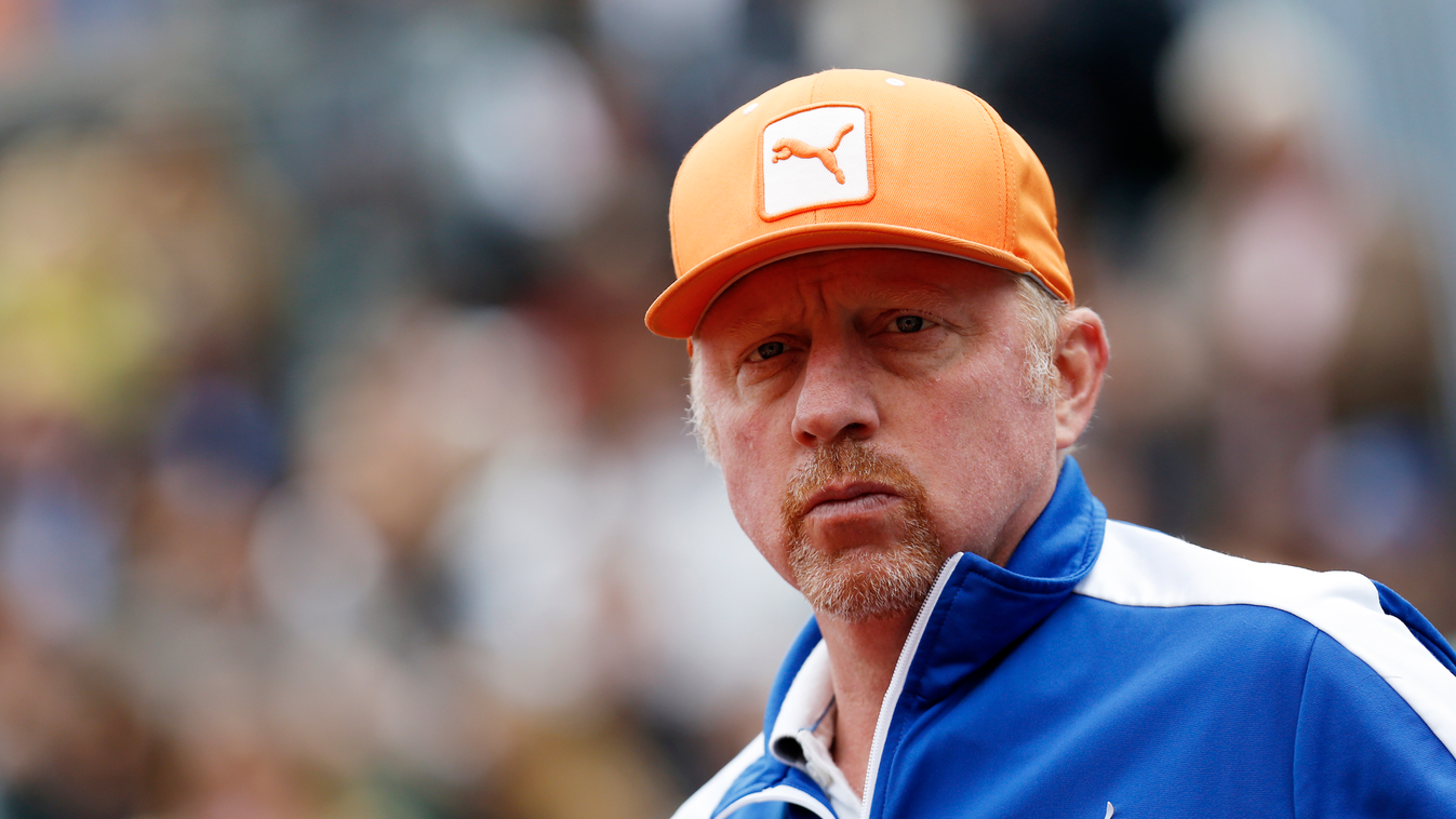 German former tennis player Boris Becker looks on during the Monte-Carlo ATP Masters Series Tournament final tennis match, on April 19, 2015 in Monaco. AFP PHOTO / JEAN-CHRISTOPHE MAGNENET 