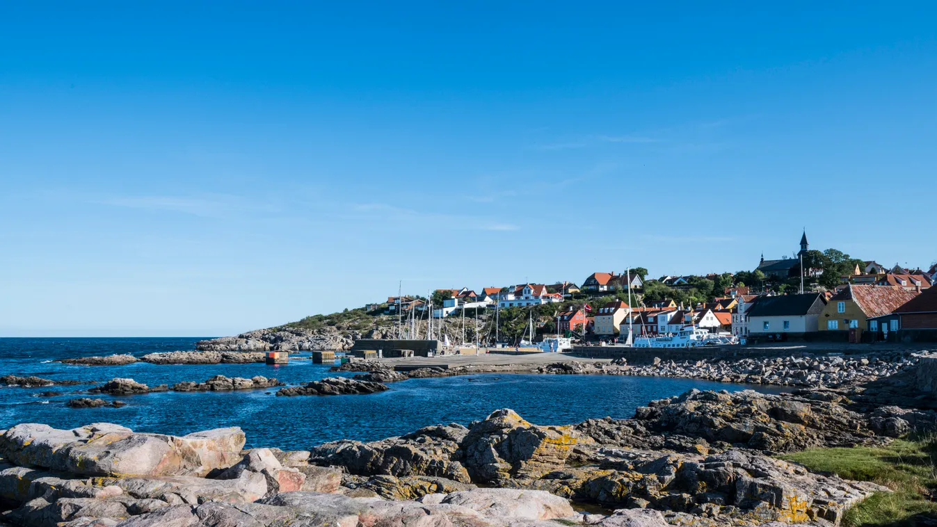 View over the town of Gudhjem, Bornholm, Denmark, Scandinavia travel destination photography colour image town bornholm denmark scandinavia gudhjem day building exterior danish culture clear sky outdoors incidental people colour color image outside touris