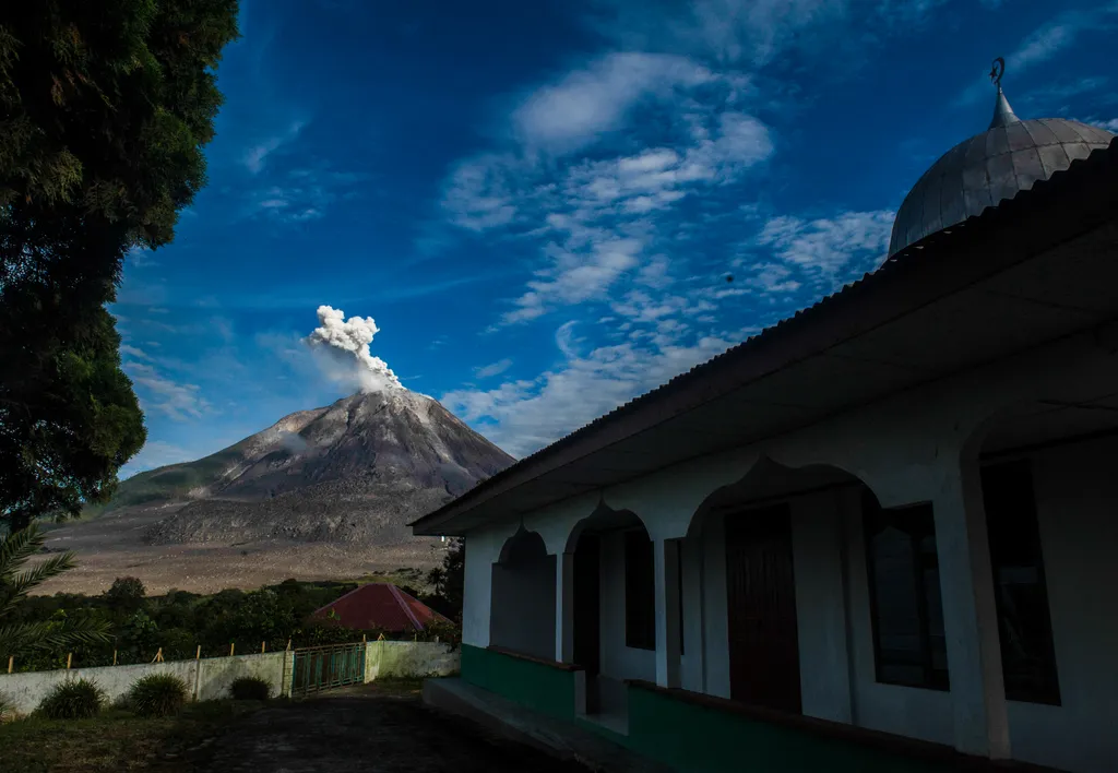 Indonesia Volcano Eruption environmental disaster sky mountains fog view nature volcano eruption ash smoke Horizontal 