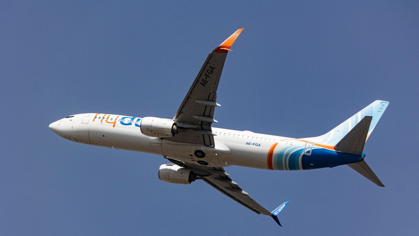 Flydubai Boeing 737-800 Taking Off From Kathmandu Airport 2022 air traffic control tower air vehicle airplane airport runway airways brand business finance and industry carrier commercial airplane editorial flight flying fuselage jet jet engine passenger 