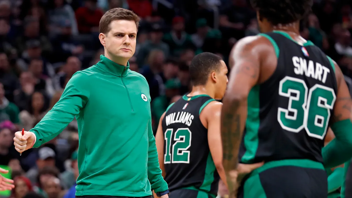 hardy Boston, MA 3-27-22: Celtics assistant coach Will Hardy is pictured as he is about to offer a fist bump with guard Marcus Smart as he comes to the sidleines. The Boston Celtics hosted the Minnesota Timberwolves in a regular season NBA basketball game