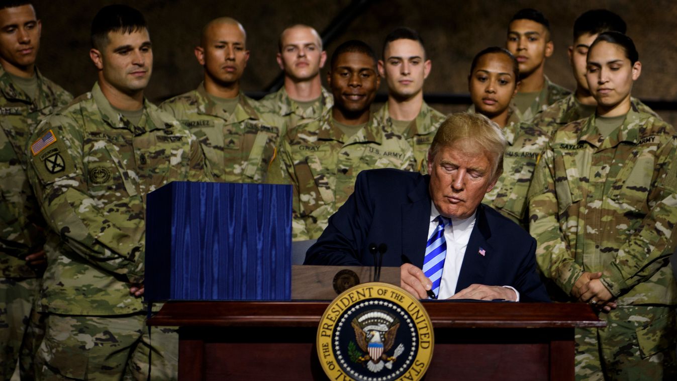 Trump signs major defense spending bill at military base in upstate New York Fort Drum Horizontal 