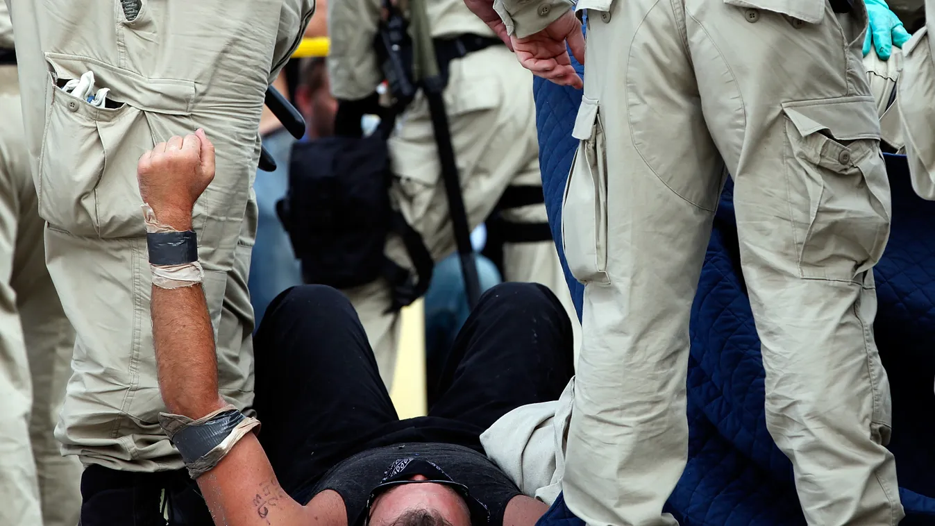 Protesters Demonstrate During The Republican National Convention Election Social Issues > on August 30, 2012 in Apollo Beach, Florida. 