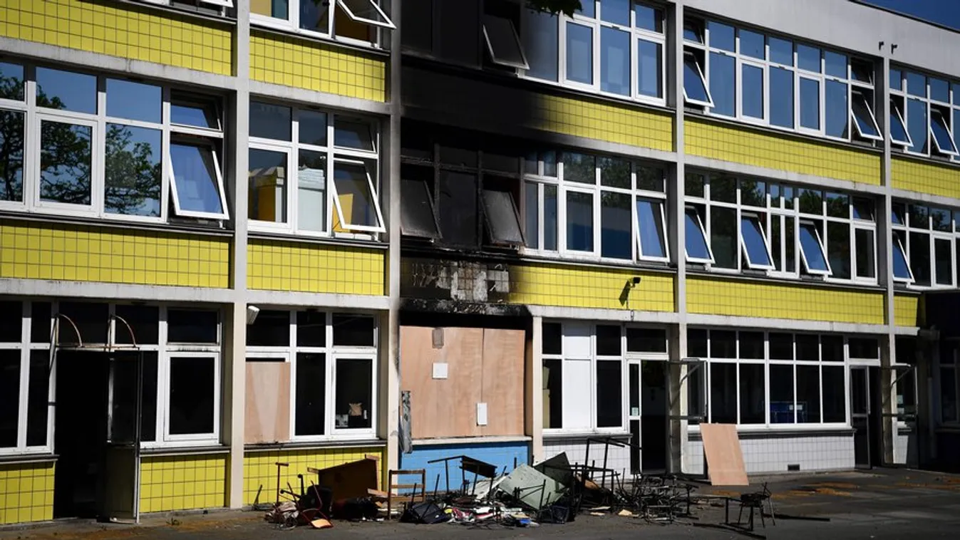 A picture taken on April 22, 2020 shows the main building of a school that was set on fire the night before in Gennevilliers, in the northern suburbs of Paris, during clashes between French police and residents. - Nine people were arrested overnight betwe
