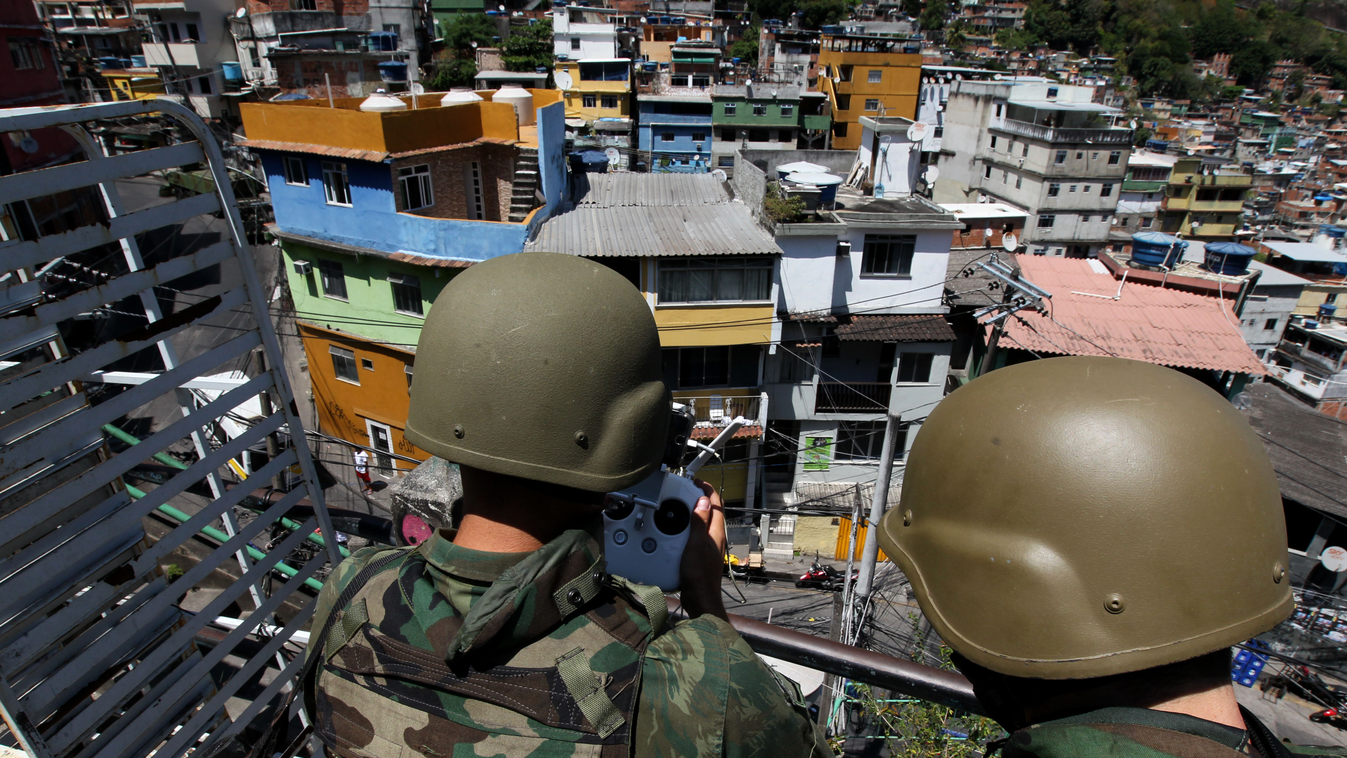 Armed Forces police patrol Rocinha favela in Sao Conrado, south zone of Rio de Janeiro, on Tuesday morning: the Military Police is again conducting 