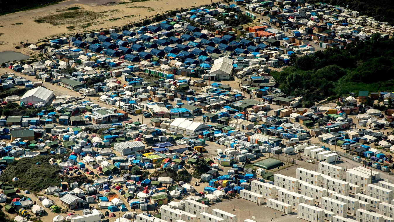 migration TOPSHOTS Horizontal (FILES) This file photo taken on August 16, 2016 shows an aerial view of tents in the "jungle" camp in Calais, northern France.
The "Jungle" camp in the northern French town of Calais, home to thousands of migrants hoping to 