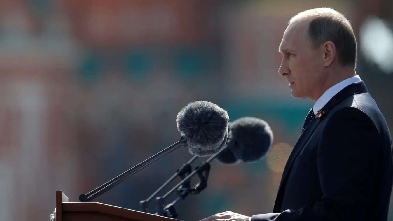 Russian President Vladimir Putin delivers a speech during the Victory Day military parade at Moscow's Red Square on May 9, 2015. Russian President Vladimir Putin presides over a huge Victory Day parade celebrating the 70th anniversary of the Soviet win ov
