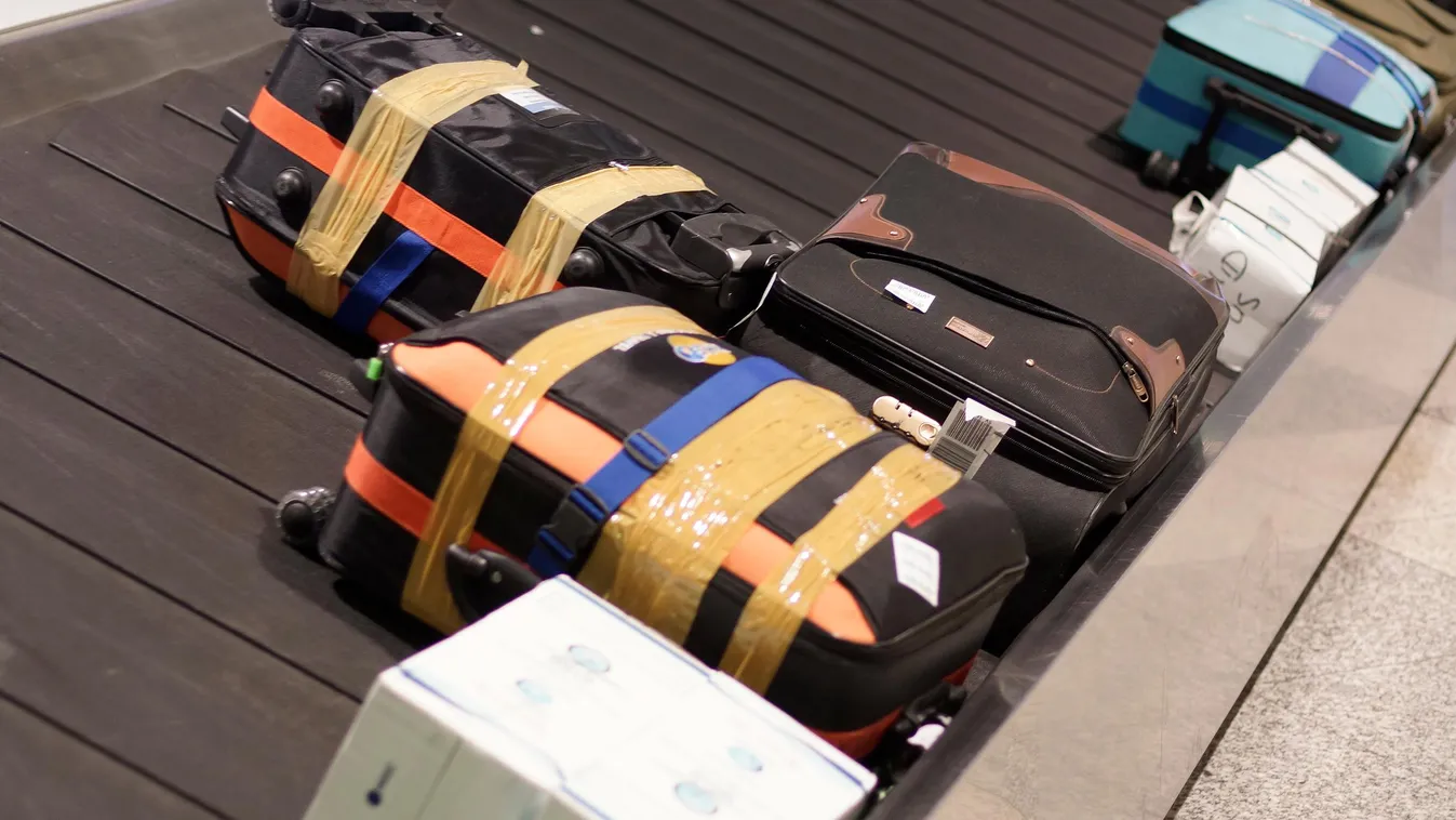 reptér poggyász bőrönd repülőtér 