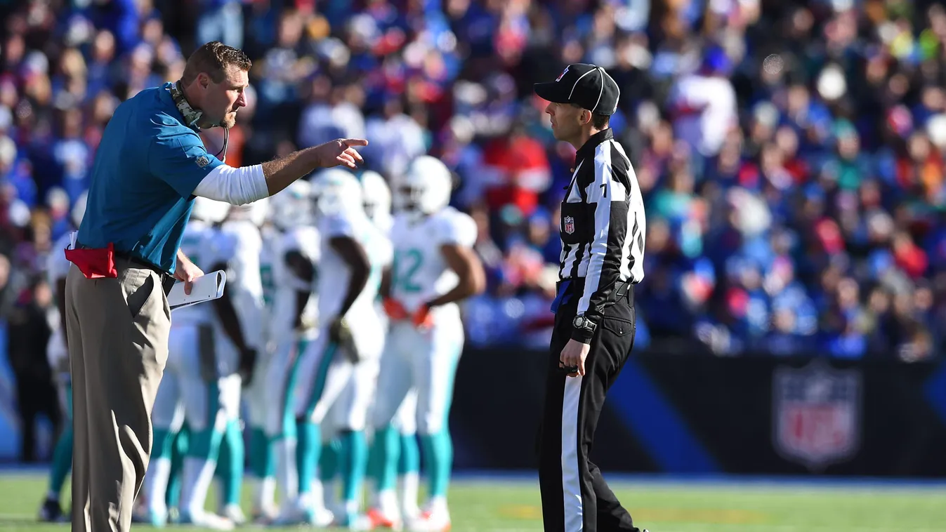 Miami Dolphins v Buffalo Bills GettyImageRank3 People SPORT HORIZONTAL Full Length American Football - Sport REFEREE Asking USA STADIUM New York State POLITICS Two People Photography Buffalo Bills American Football Referee NFL Orchard Park Ralph Wilson St