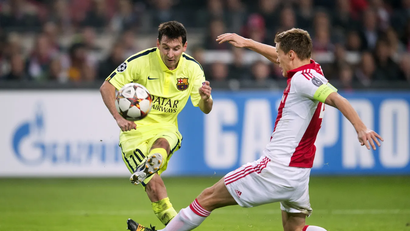 511785539 vs FC Barcelona Lionel Messi (L) in action against Niklas Moisander of Ajax during the UEFA Champions League football match between Ajax Amsterdam and FC Barcelona in Amsterdam, on November 5, 2014. AFP PHOTO/ANP / OLAF KRAAK   ==NETHERLANDS OUT
