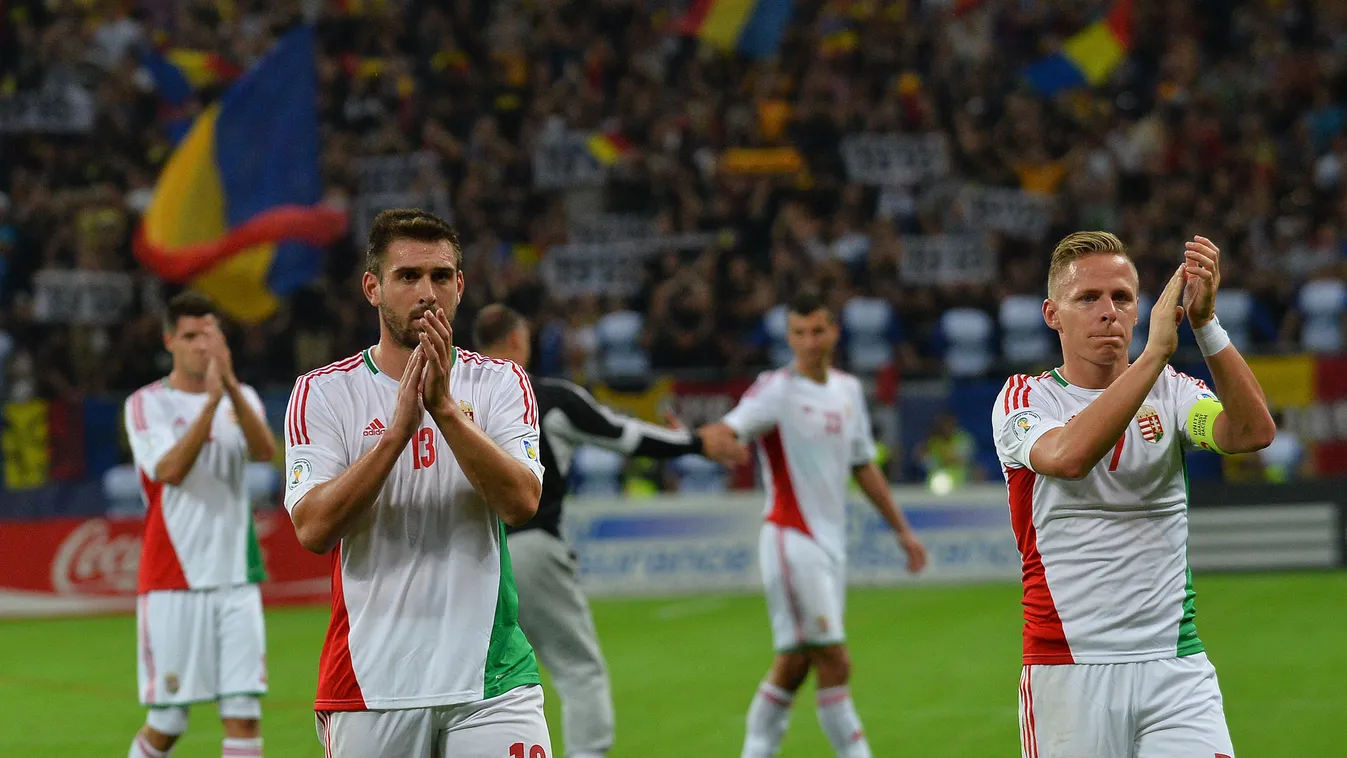 179541075 Hungary's player Daniel Bode (L) and Hungary's player Balazs Dzsudzsak react at the final whistle of the FIFA World Cup 2014 group D qualifying football match Romania vs Hungary on September 6, 2013 in Bucharest, Romania. Romania won 3-0.     AF