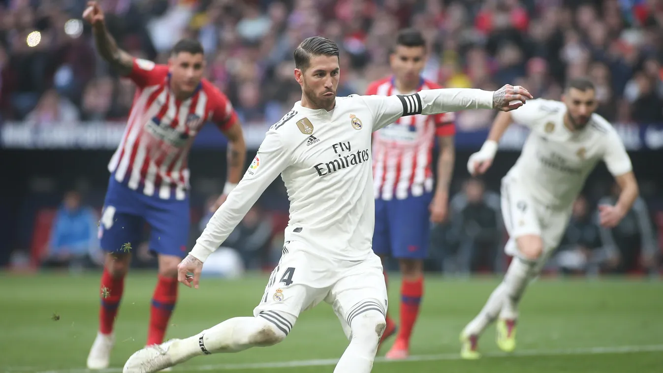 Club Atletico de Madrid v Real Madrid CF - La Liga PLAYER Sports SOCCER PLAYER TOURNAMENT SPORTS EQUIPMENT Sport venue Football player Team sport BALL GAME Soccer GRASS person FIELD SPORT GAME Real Madrid CF Sergio Ramos of Real Madrid Club Atletico Liga 