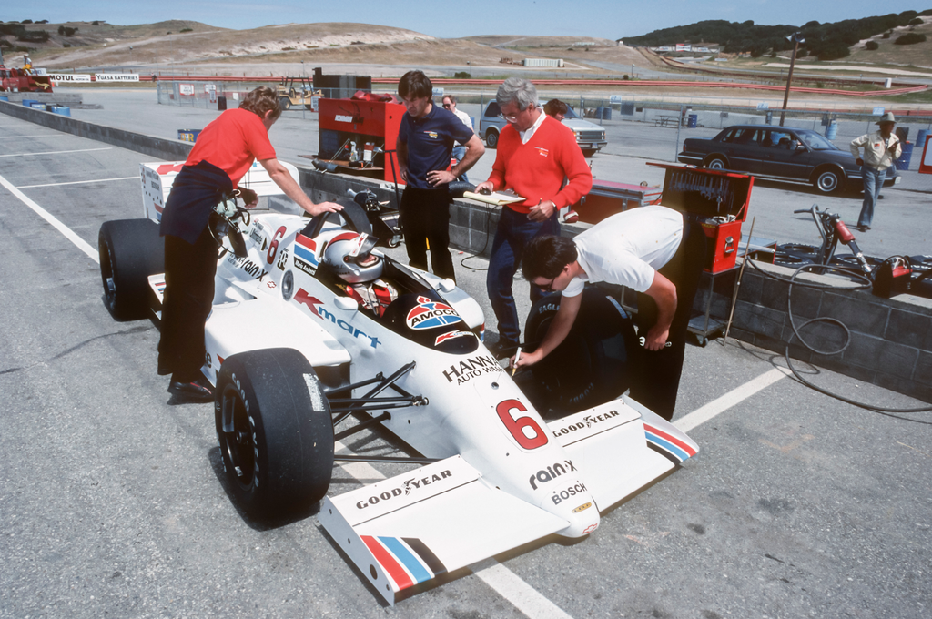 1988 Laguna Seca MONTEREY, CA -  APRIL 1988:  Mario Andretti of the USA and Newman/Haas Racing talks with his team during a car testing day of his Indy Car during in April 1988 at Laguna Seca Raceway in Monterey, California.  (Photo by David Madison/Getty