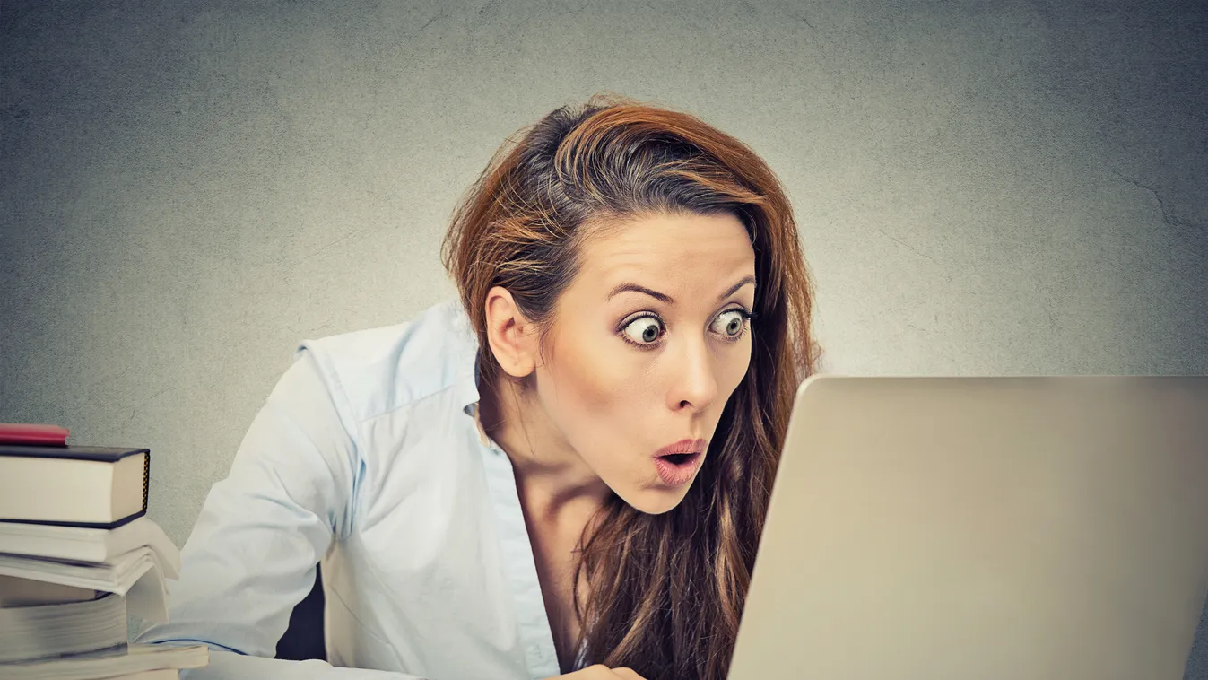 shocked business woman sitting in front of laptop computer Shirt Spam Bad News Computer Service Mail The Media Student Information Medium Women Female Ignorance Computer Network Job Facial Expression E-Mail Looking Complexity Irritation Customer Ruined Fa