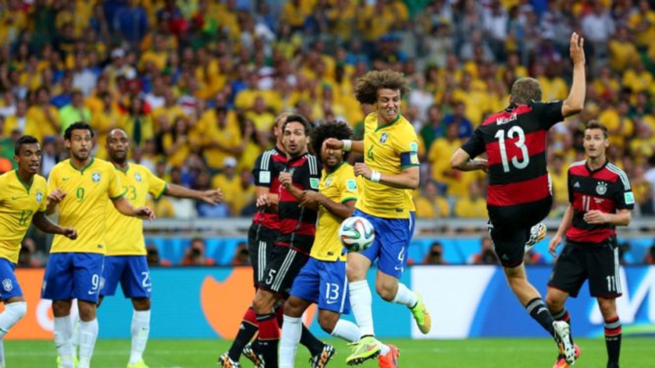 Brazil v Germany: Semi Final - 2014 FIFA World Cup Brazil Football Soccer 2014 FIFA World Cup FIFA World Cup 2014 world cup FIFA World Cup topics topix bestof toppics toppix BELO HORIZONTE, BRAZIL - JULY 08: Thomas Mueller (2nd R) of Germany scores his te