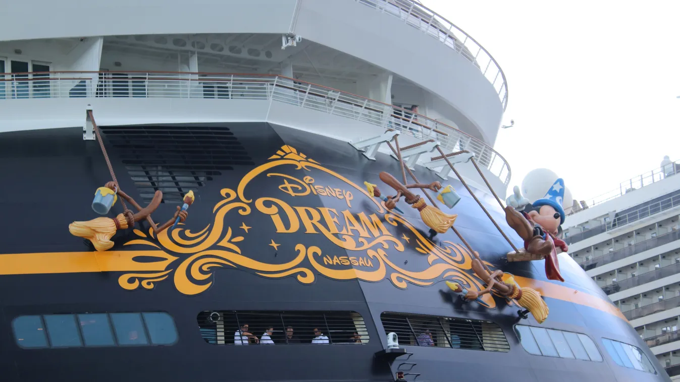 Disney Dream Cruise  Nassau,,Bahamas-usa,August,10,,2019:,Disney,Dream,Cruiseliner,Parked,A nassau,harbor,yellow,ship,tourism,holiday,life,mickey,sea,mouse, 