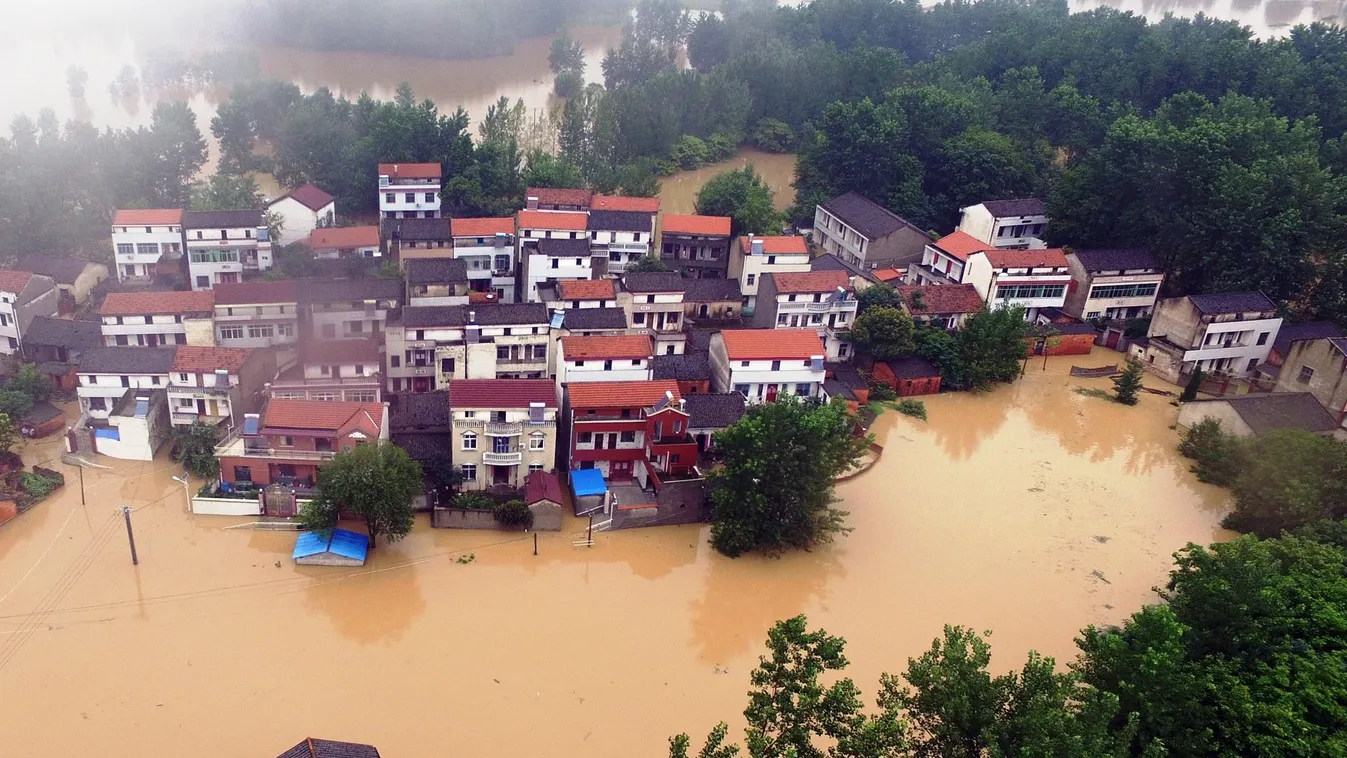 ce SQUARE FORMAT (160702) -- WUHAN, July 2, 2016 (Xinhua) -- An aerial photo taken on July 2, 2016 shows inundated areas in Xinzhou District after a dike breach, in Wuhan, central China's Hubei Province. Heavy rainfall caused a dike breach on the Jushui R