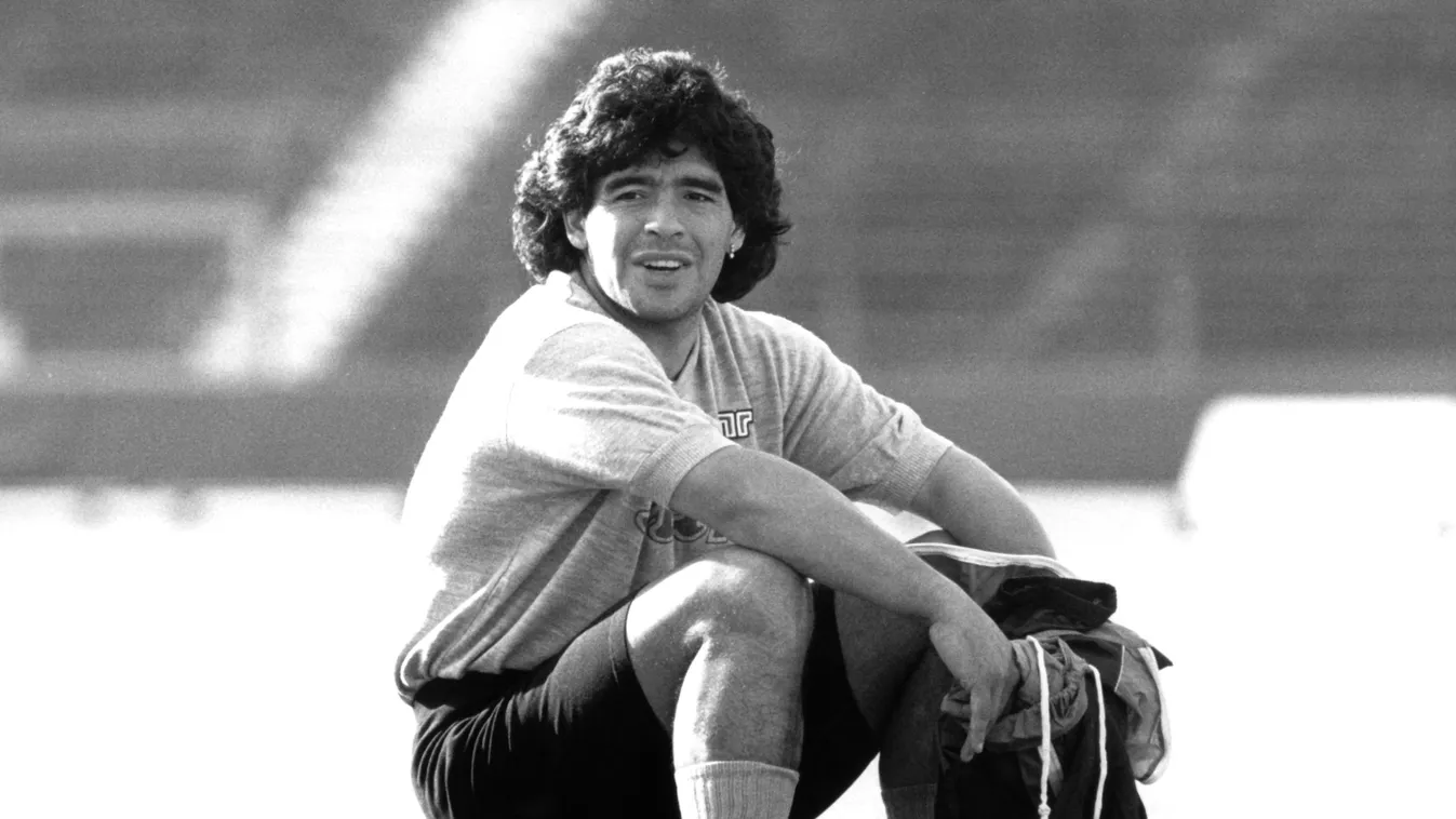 Diego Armando Maradona .people file picture ball .soccer .Argentina SEATED photo noir et blanc sports SPORT SPO 