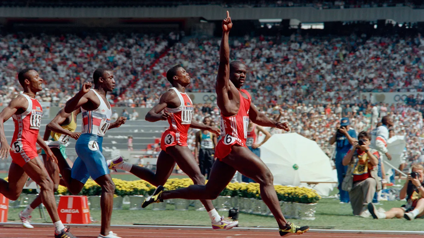 Horizontal SPORT-ACTION PHOTO OF THE MONTH OLYMPIC GAMES WINNER ATHLETICS FINISH LINE 100 METERS 