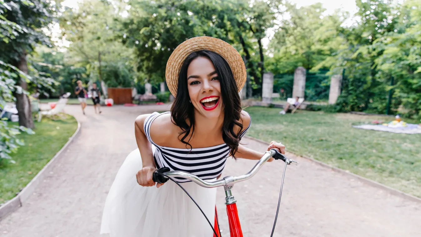adult attractive beautiful beauty bicycle bike brunette caucasian cheerful city cute europe european fashion female fun funny girl glamour happy hat joy joyful lady latin laugh life lifestyle model nature one outdoor outside people person portrait positiv