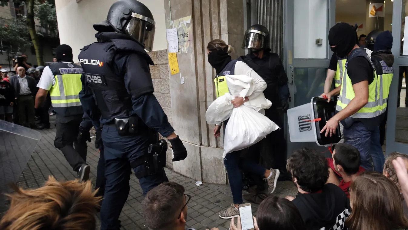 referenda Horizontal Spanish police seize ballot boxes in a polling station in Barcelona, on October 1, 2017, on the day of a referendum on independence for Catalonia banned by Madrid.

More than 5.3 million Catalans are called today to vote in a referend