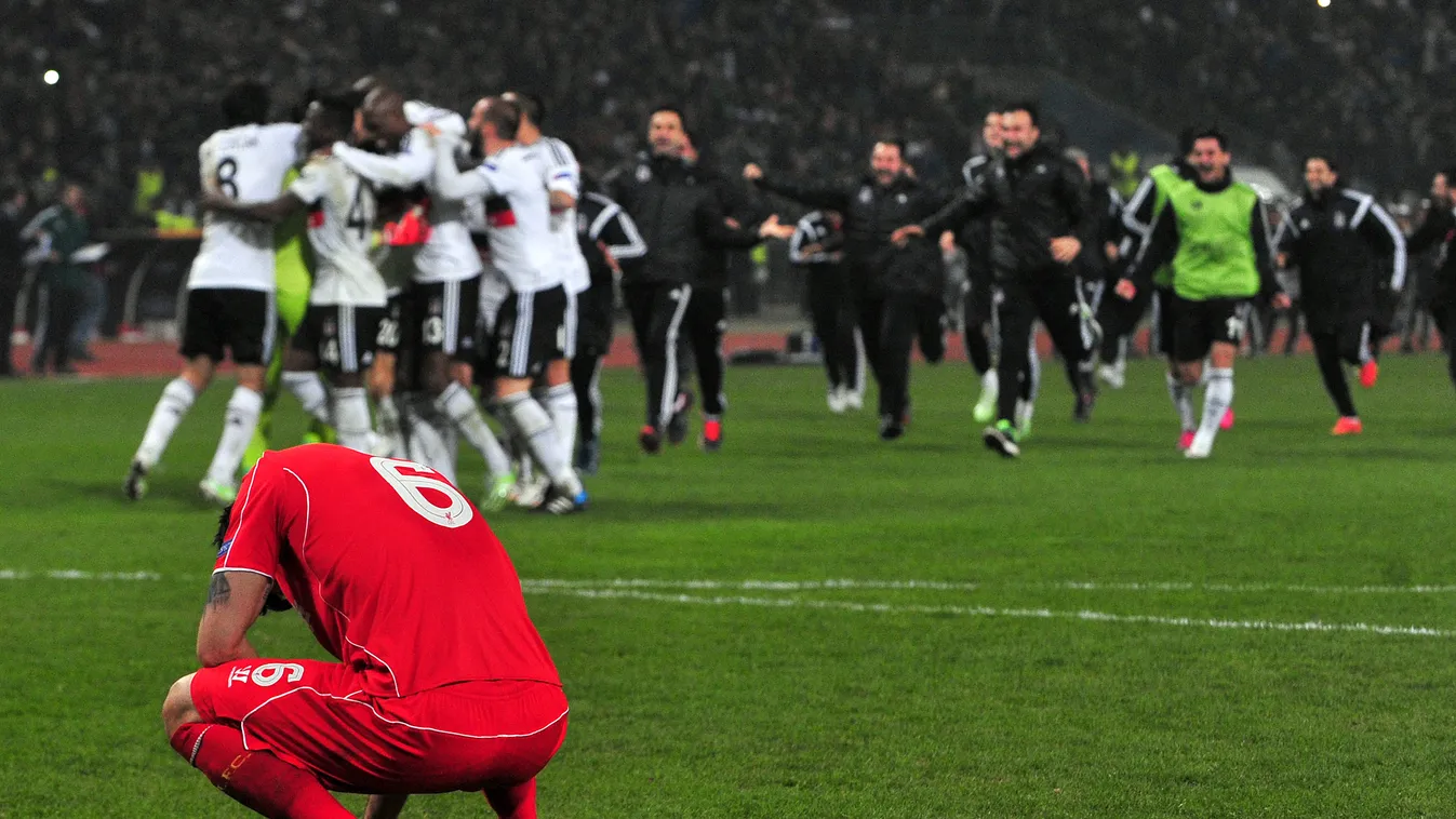 531963541 Liverpool's Dejn Lovren (L) reacts after missing the last penalty while Besiktas' players celebrate during the UEFA Europa League round of 32 second-leg football match Besiktas vs Liverpool at Ataturk Olympic Stadium in Istanbul on February 26, 