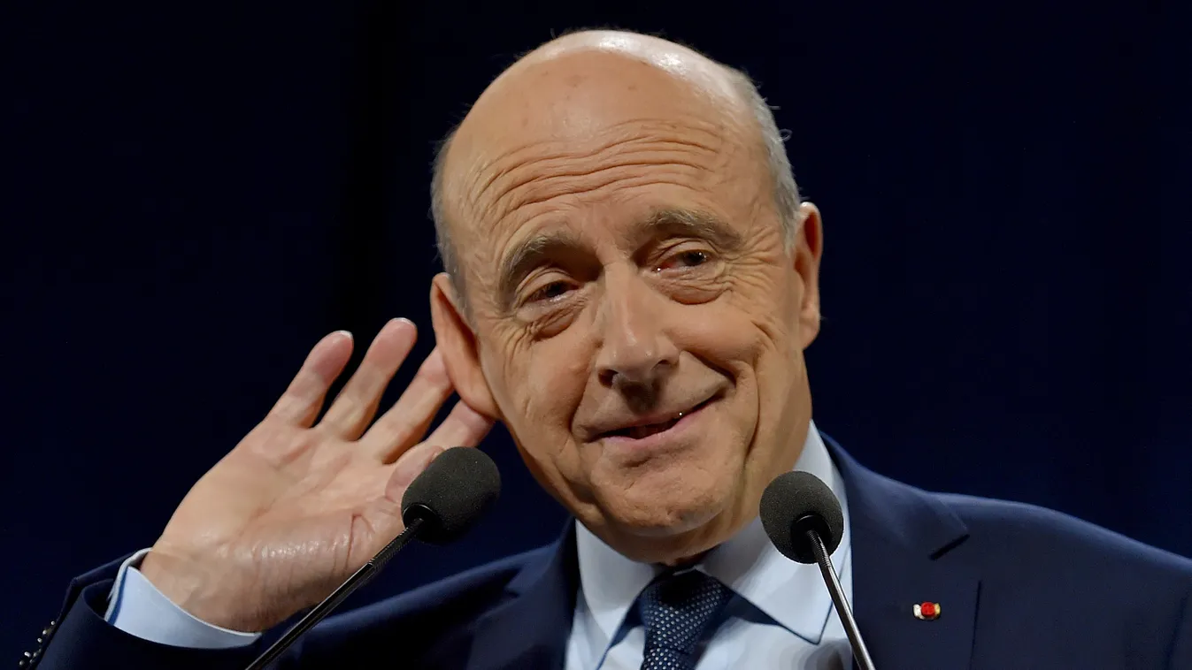 Horizontal French former Prime minister and candidate in the Les Republicains party primary ahead of the presidential election Alain Juppe gestures as he delivers a speech during a campaign meeting, on October 19, 2016 in Rennes, western France.   / AFP P