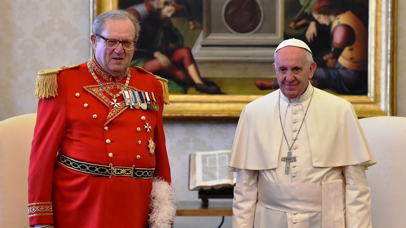 Horizontal (FILES) This file photo taken on June 23, 2016 shows Pope Francis (R) and Robert Matthew Festing, Prince and Grand Master of the Sovereign Order of Malta, during a private audience at the Vatican.
Pope Francis has ended a bitter dispute with th