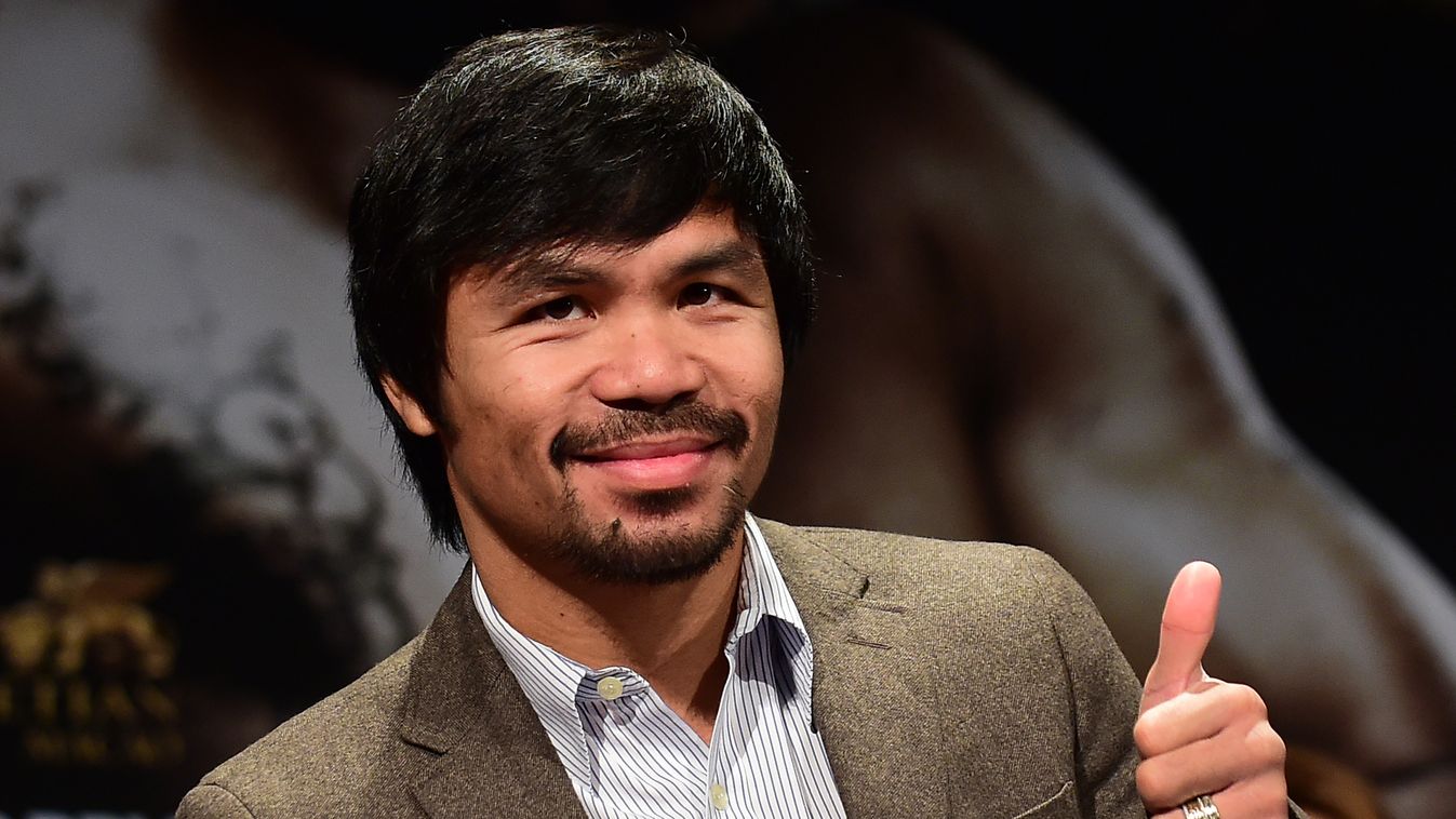 Pacquiao plans if Mayweather says no (FILES) In this September 3, 2014 file photo, Filipino boxing star Manny Pacquiao gestures on arrival for a press conference with fellow boxer Chris Algieri in Los Angeles, California. Pacquiao has a plan in place if y