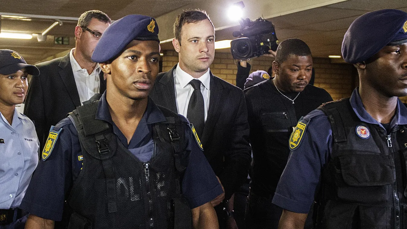 SAFRICA-TRIAL-PISTORIUS-SPORT South African Paralympian athlete Oscar Pistorius arrives at the High Court in Pretoria on September 12, 2014. Pistorius arrived in court on Friday to face judgement for culpable homicide, a verdict that will decide if he wal