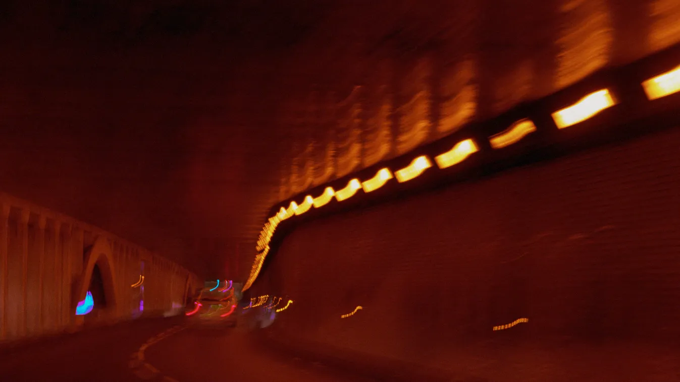 safety dividing line blurred no people vision road transportion highways tiredness fluorescent lights tail light turn indoors moving along color image light dark curve speed city planning freeway fatigue nobody roads tunnels dividing lines lights visions 
