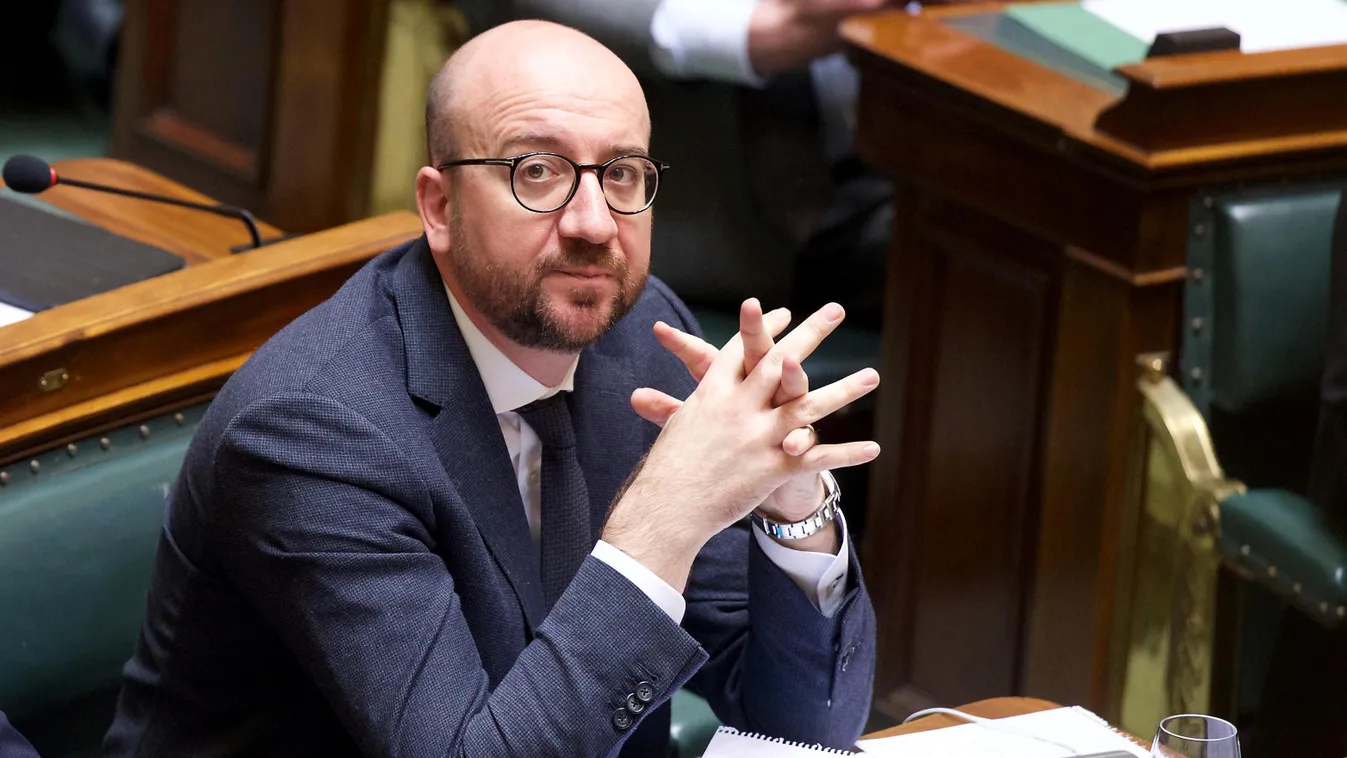 Horizontal Belgian Prime Minister Charles Michel attends a plenary session of the Chamber at the federal Parliament, in Brussels, on March 24, 2016. 
It's the first session after suicide bombing attacks of terrorists on March 22nd in Zaventem airport and 