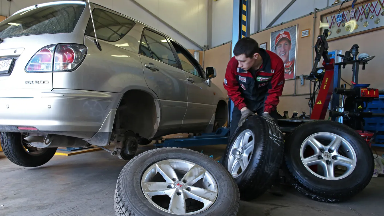 Work of tire centers in Russian cities wheel car vehicle repair tyre tire summer tires changing tires car service center change of tires tire center HORIZONTAL 