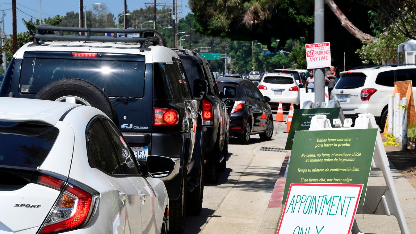 health Horizontal Drivers wait in line for entry to a COVID-19 drive-through test site in Los Angeles, California on July 17, 2020 as coronavirus cases have surged to record levels in Los Angeles County and surrounding areas in southern California. - The 