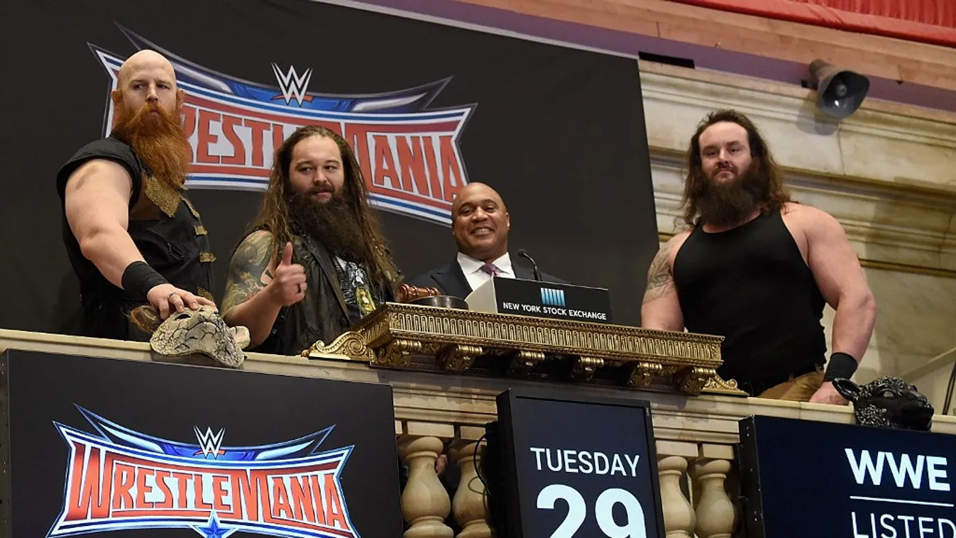 WWE Rings The New York Stock Exchange Opening Bell In Honor Of WrestleMania 32 GettyImageRank2 Head Capital People Combat Sport USA International Landmark New York City New York Stock Exchange Four People Photography Stock Market and Exchange Honor Arts C