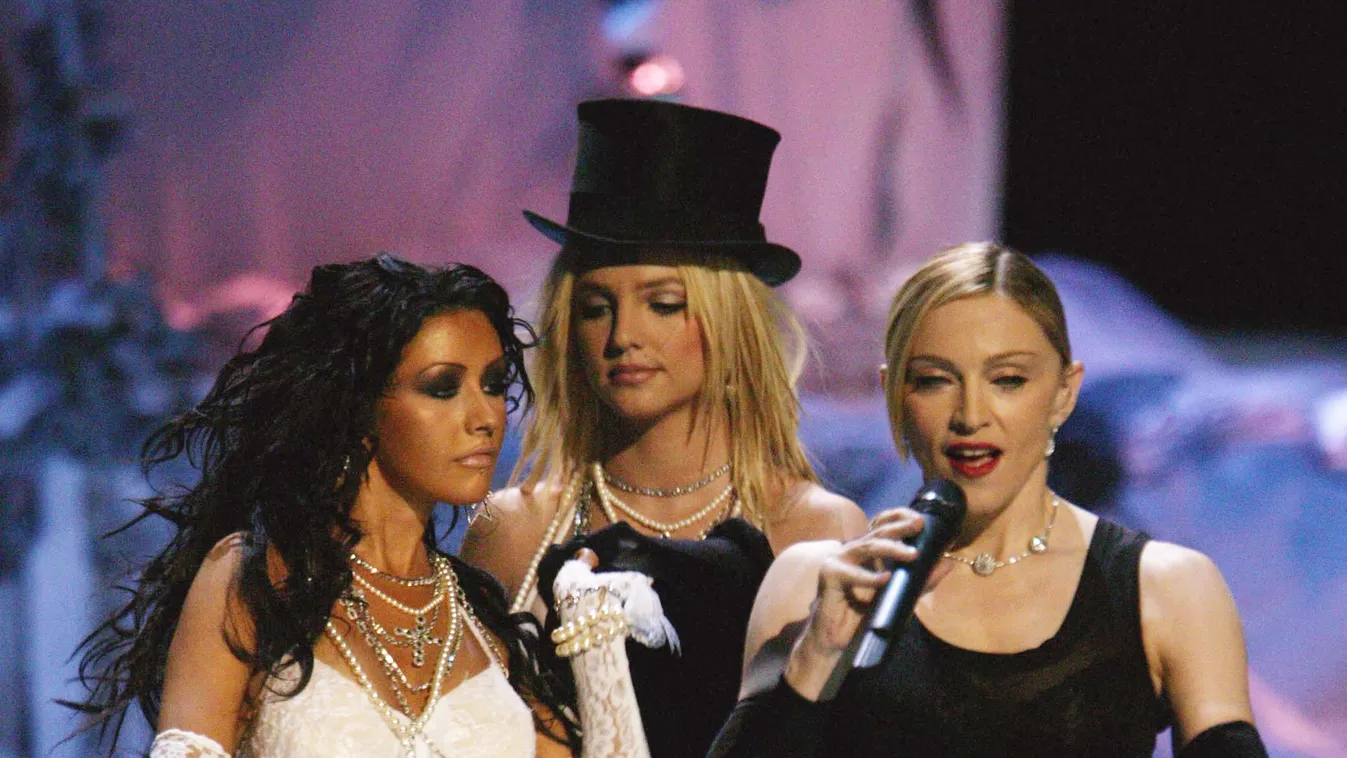 Christina Aguilera, Madonna, and Britney Spears full length christina aguilera madonna britney spears performance stage awards 243033 Vertical CELEBRITY TELEVISION MUSIC ENTERTAINMENT 