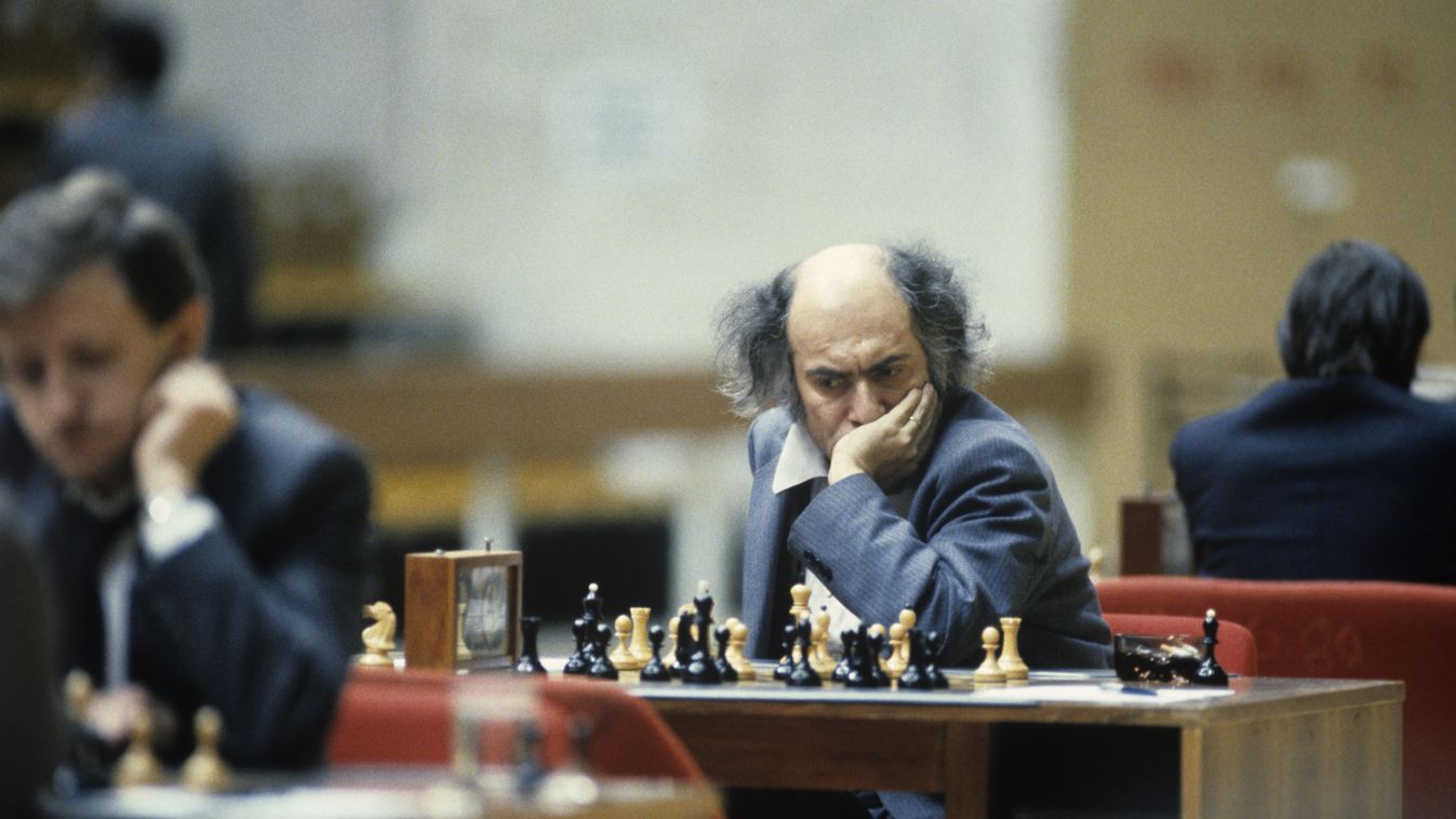 Mikhail Tal during 50th USSR chess championship chess board chess player chess pieces HORIZONTAL 
