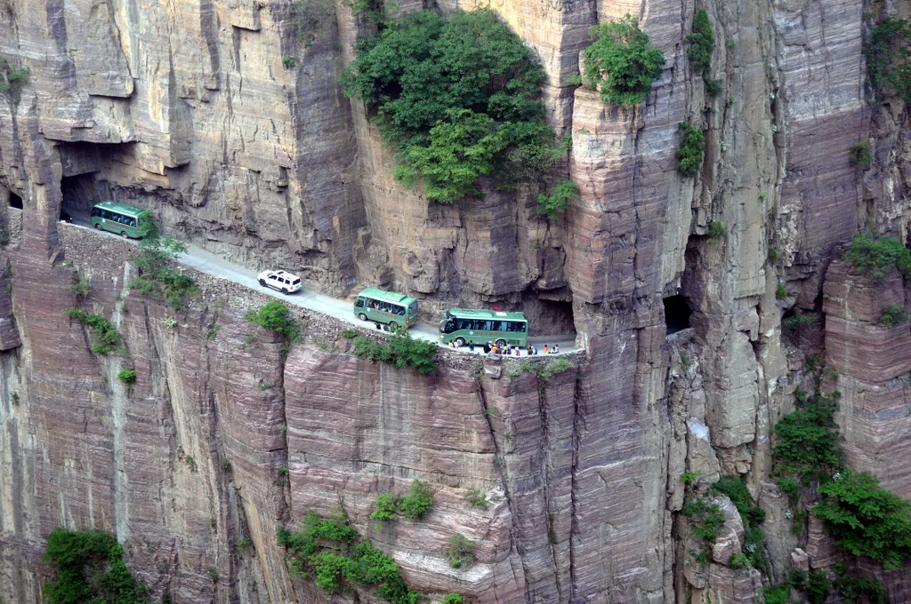 A világ legveszélyesebb útjai. Guoliang Tunnel Road China  Guoliang Tunnel, China's scarist road carved into a mountain China Chinese Henan Taihang Mountains Guoliang tunnel road highway cliff Horizontal SQUARE FORMAT 
