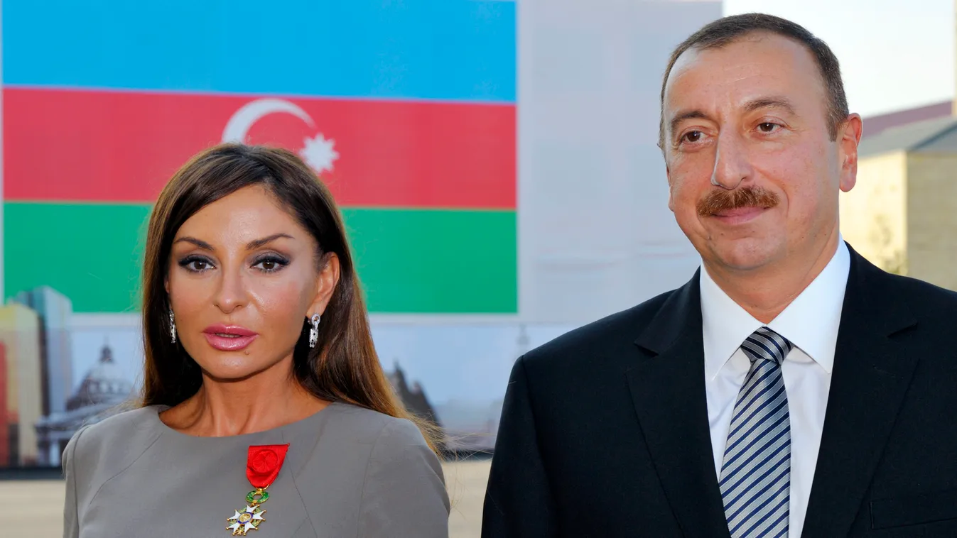- HORIZONTAL PRESIDENT PRESIDENT OF THE REPUBLIC OFFICIAL VISIT DIPLOMACY FIRST LADY WIFE MEDAL LEGION OF HONOR FLAG Azerbaijan's President Ilham Aliyev (R) poses beside first lady Mehriban Aliyeva after she was awarded with the Legion d'Honneur medal fro