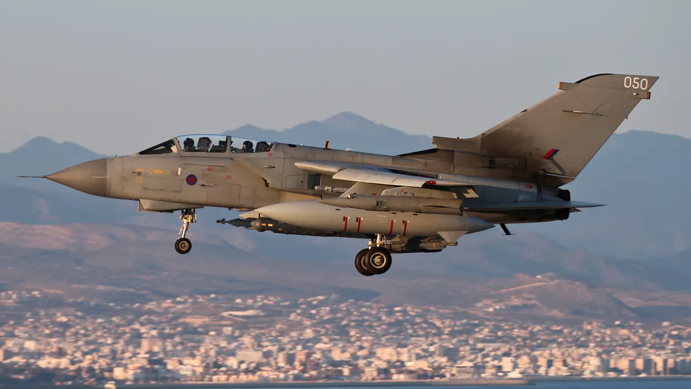 Horizontal A handout picture retrieved from the British Ministry of Defence's Defence News Imagery website on December 1, 2015 shows a British Royal Air Force RAF Tornado GR4 pictured on return to RAF Akrotiri Cyprus after an armed reconnaissance mission 