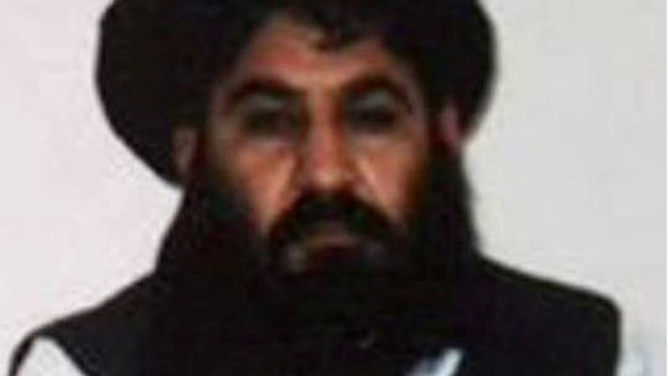 Vertical This handout photograph released by The Afghan Taliban on December 3, 2015, which was taken on a mobile phone in mid-2014 is said to show Afghan Taliban leader Mullah Akhtar Mansour posing for a photograph at an undisclosed locationin Afghanistan