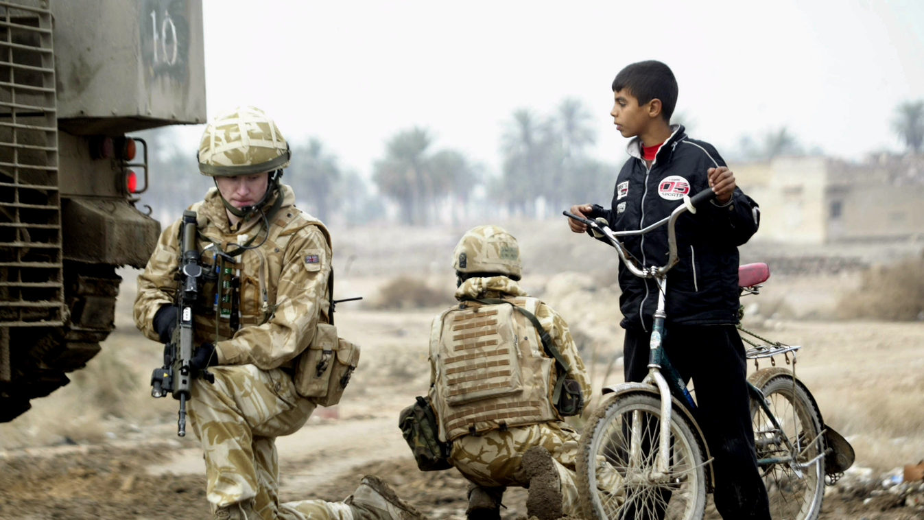 IRAQ-UNREST-BRITAIN-TOLL Horizontal MIDDLE EAST AFTER THE WAR FOREIGN ARMY CHILD IN WAR BOY SOLDIER ON THE FRINGE OF TERRORIST ATTACKS 