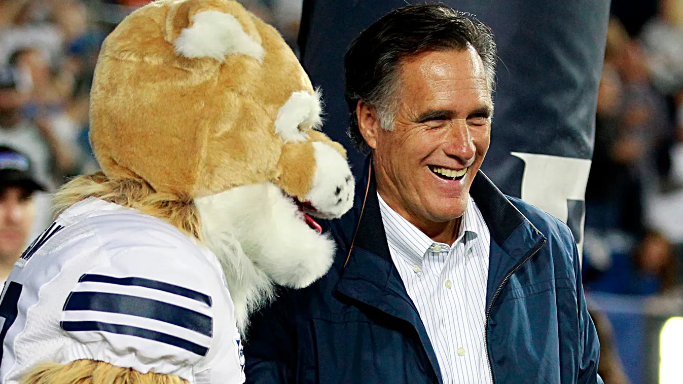 GettyImageRank3 College Football SPORT AMERICAN FOOTBALL NCAA College Football PROVO, UT - SEPTEMBER 30: Mitt Romney, former Republican presidential candidate jokes around with the BYU mascot "Cosmo" before the Brigham Young Cougars and Toledo Rockets foo