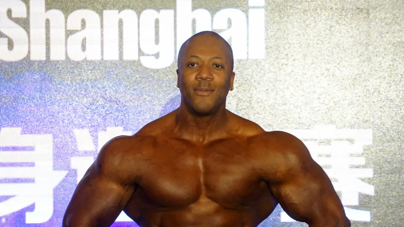 Shawn Rhoden shows off powerful muscles to highlight bodybuilding competition in Shanghai China Chinese Shanghai Shawn Rhoden bodybuilder body bodybuilding Horizontal 