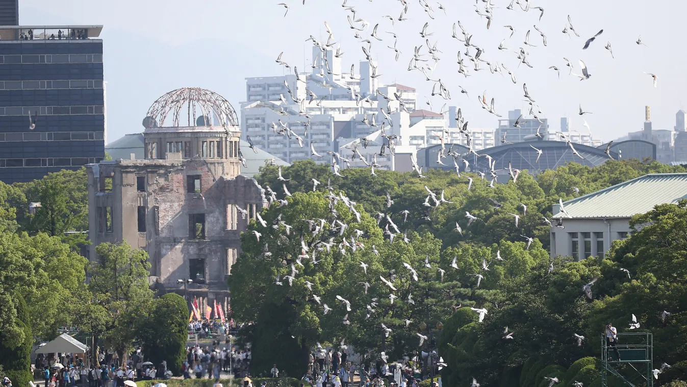Hibakusha Nagasaki citizen bereaved family SURVIVOR mourn the peace declaration Prime Minister Shinzo Abe nuclear WAR WW2 CHILD WOMAN MAN female male BABY Pigeons are released during the Peace Memorial Ceremony to console the souls of those who were lost 