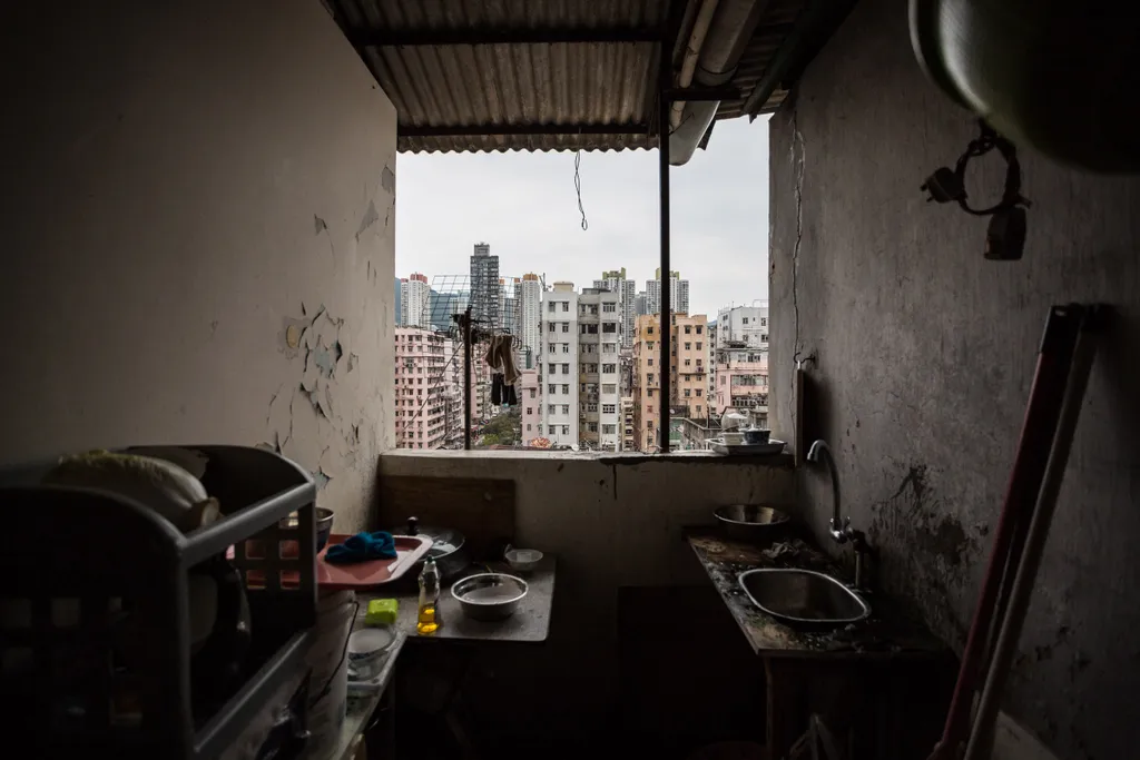 social Horizontal This picture taken on April 18, 2016 shows the view from the communal outdoor kitchen used by tenants living in "cubicle" flats built within a Hong Kong 